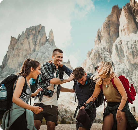 Travelers hiking together in mountains